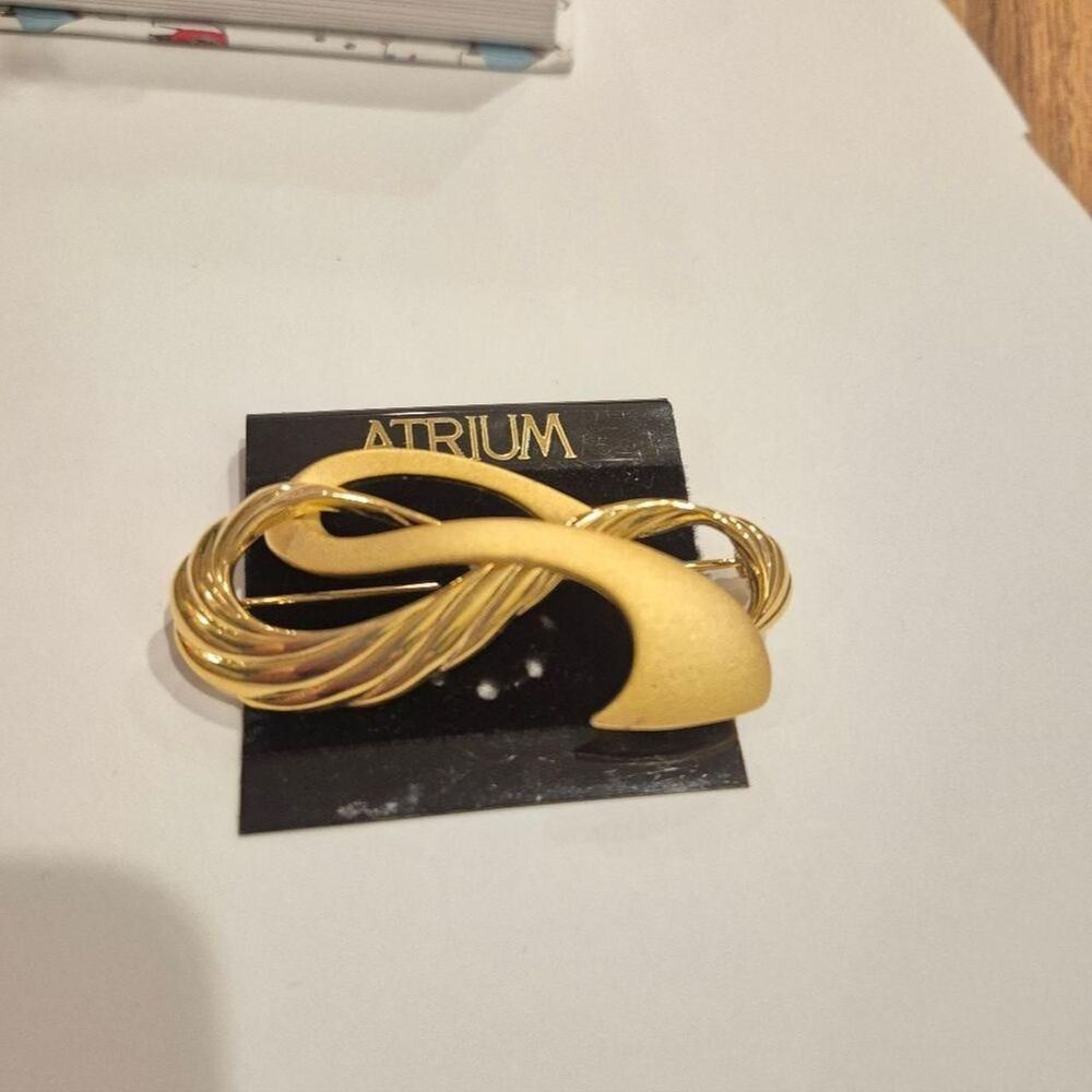 Gold Ribbon Swirl Brooch by Antrium